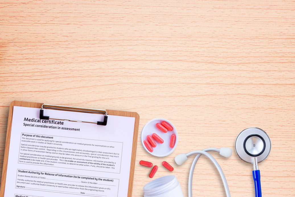 Drug and Pill with Blue Stethoscope and Medical Certificate Form